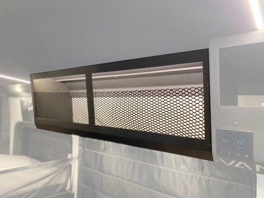 A black 50-inch overhead cabinet with an exoskeleton design and mesh front, mounted inside a van.