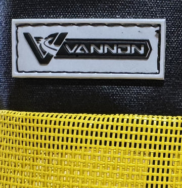 VANNON logo on a black and yellow textured surface