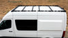 A white Sprinter van with a black textured powder-coat roof rack installed on top.