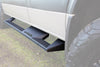 Aluminum running rail set with a black powder-coated finish installed on the side of a Sprinter van